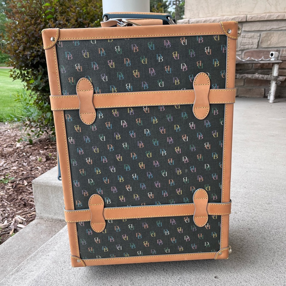 RARE Dooney and Bourke black rainbow monogram rolling trunk